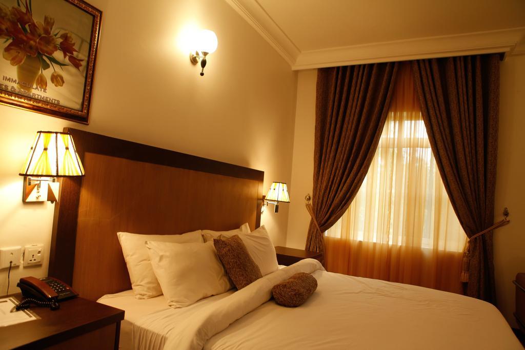 Immaculate Suites And Apartments Mobushipe Quarto foto